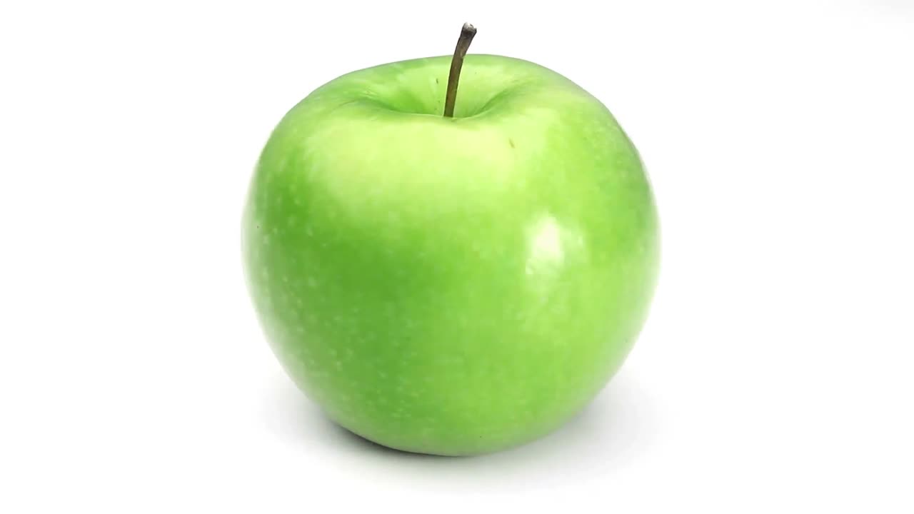 Roterende grønt æble