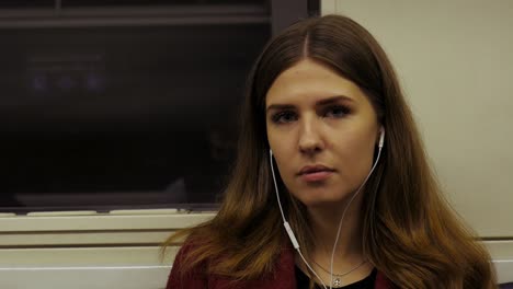 young woman on a subway