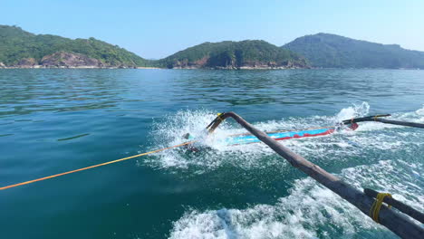 oars of traditional fishing boat at ocean goa in india 4k
