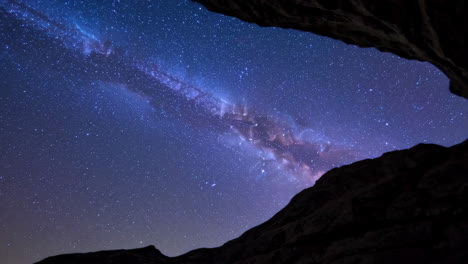 milky way through a rock arch