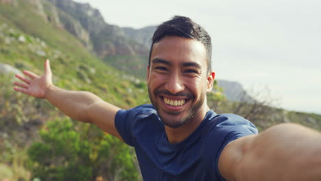 man taking selfie in mountains