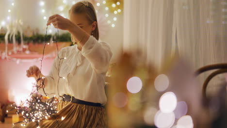 preparing for christmas woman organizes decorations in living room