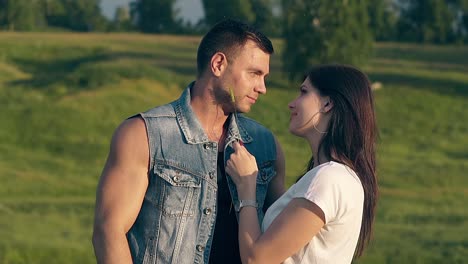 close-view-young-brunette-woman-runs-wheat-on-man-cheek-chin