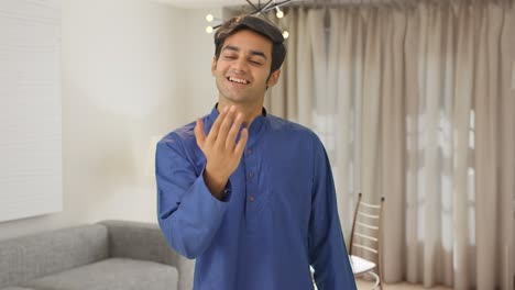 Cute-Indian-man-calling-someone