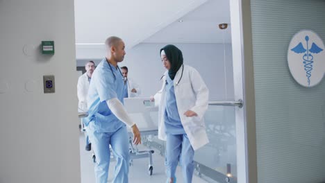 doctors running with patient in hospital bed in emergency 4k