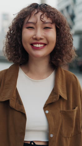smiling woman portrait in city