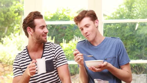 Happy-homosexual-taking-breakfast-