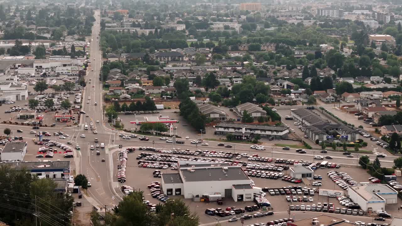 4K CGI aerial footage of Kelowna's downtown, showcasing the vibrant cityscape with its beautiful lakeside views, parks, and urban architecture.