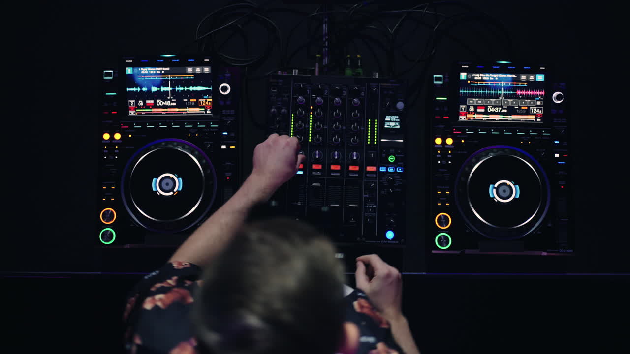 DJ mixing music on turntables