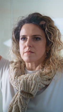 woman with a knitted scarf