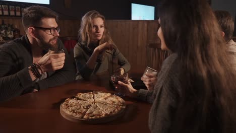 friends enjoying dinner and drinks