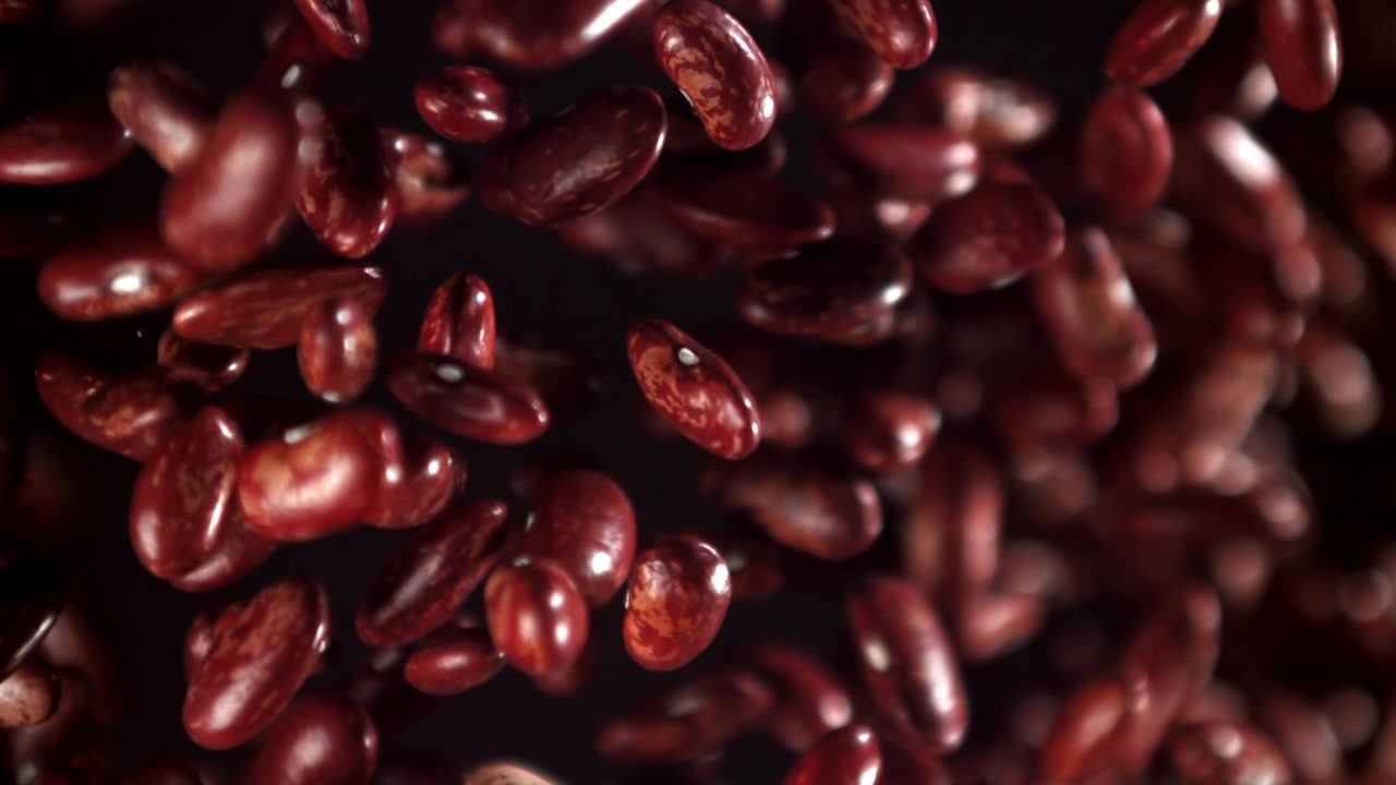 Red Kidney Beans Falling in Super Slow Motion