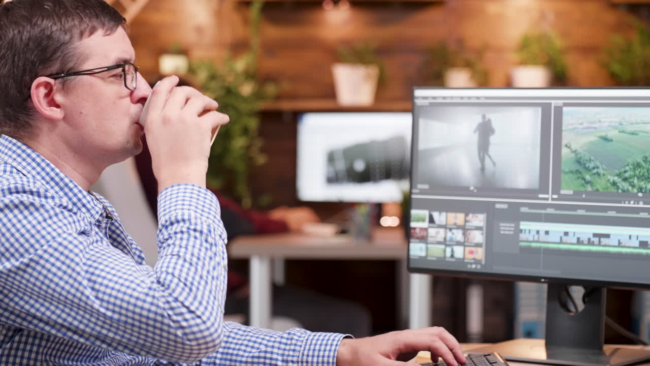 Man working on video editing in post production office
