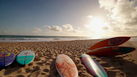 beautiful beach sunset with surfboards