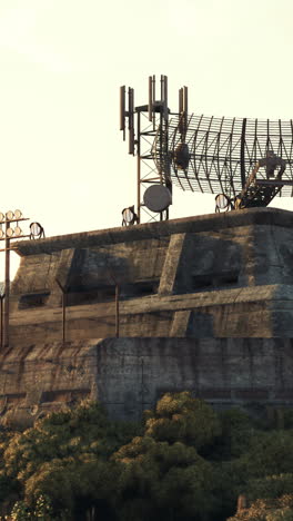 abandoned military bunker with radar and antennas