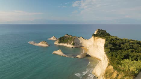 cinematic establishing shot of cape drastis on corfu, one of greece's ionian islands