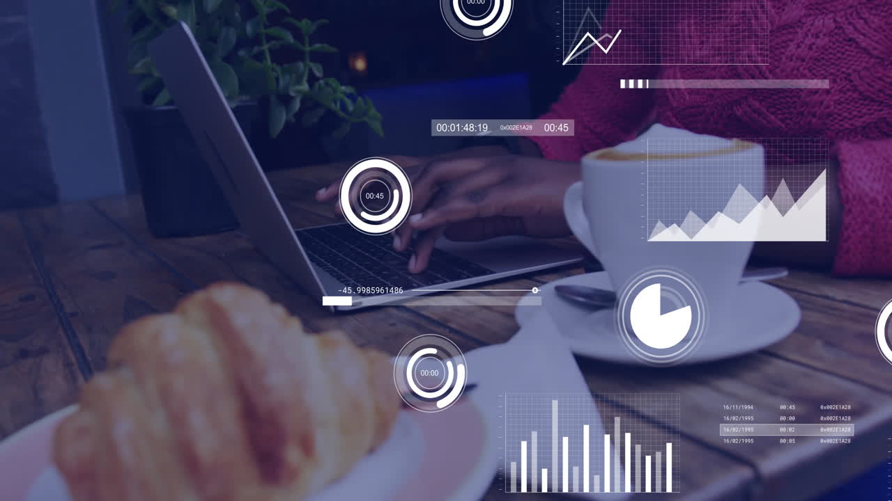 Typing on laptop with coffee and croissant, data analytics animation over scene