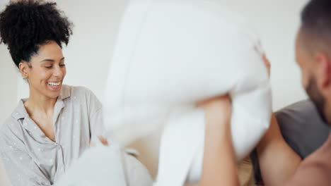 happy, bed and parents in pillow fight with kid