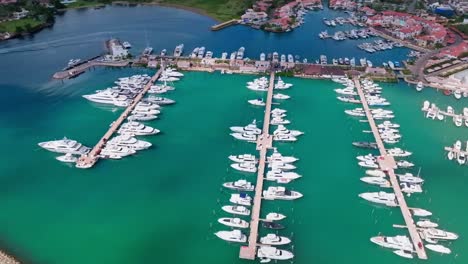 luxury boats moored in port of casa de campo marina, la romana in dominican republic