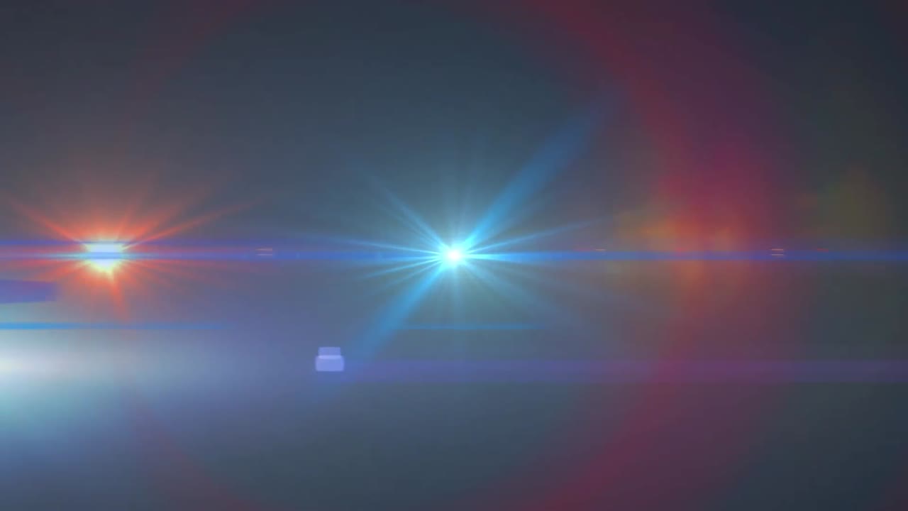 Animazione digitale di un punto di luce e un bagliore dell'obiettivo su sfondo blu