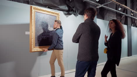 art gallery visitors viewing artwork