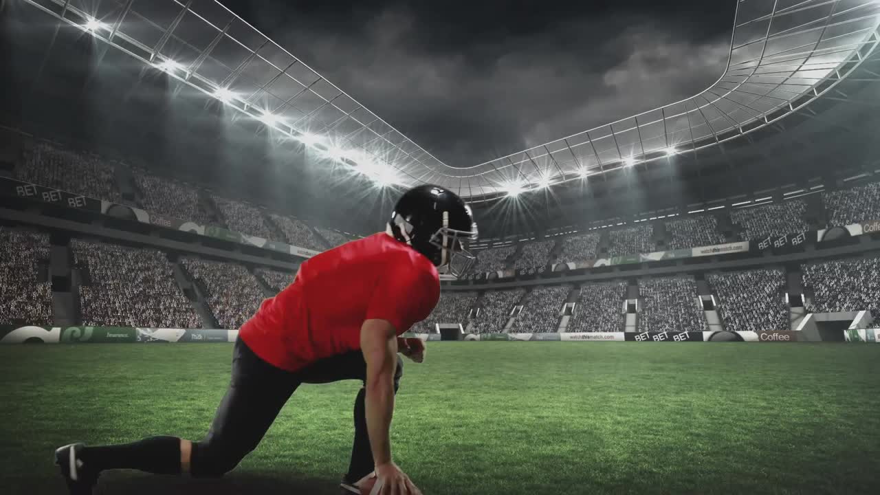 Giocatore di football americano in ginocchio per la difesa
