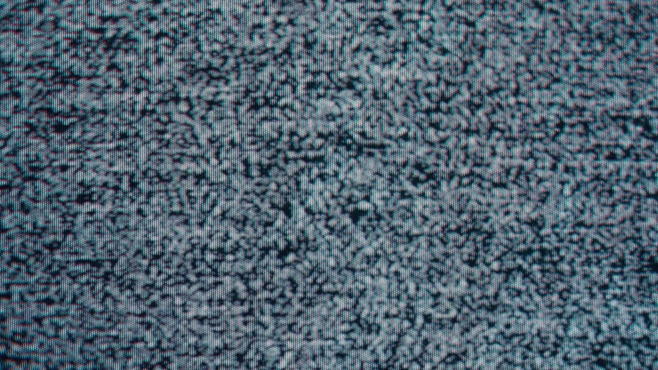 Static showing on a vintage television, a true testament to analog technology