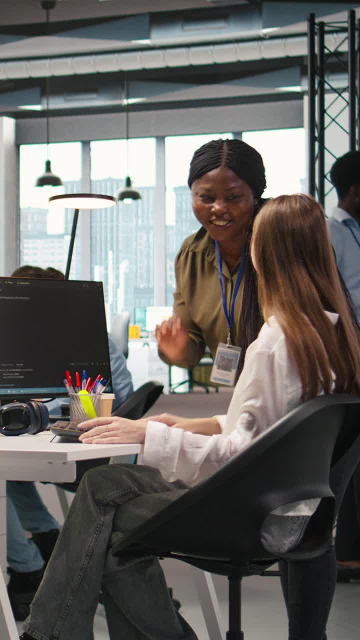 Vertical video Manager supervising young trainee in office using AI technology