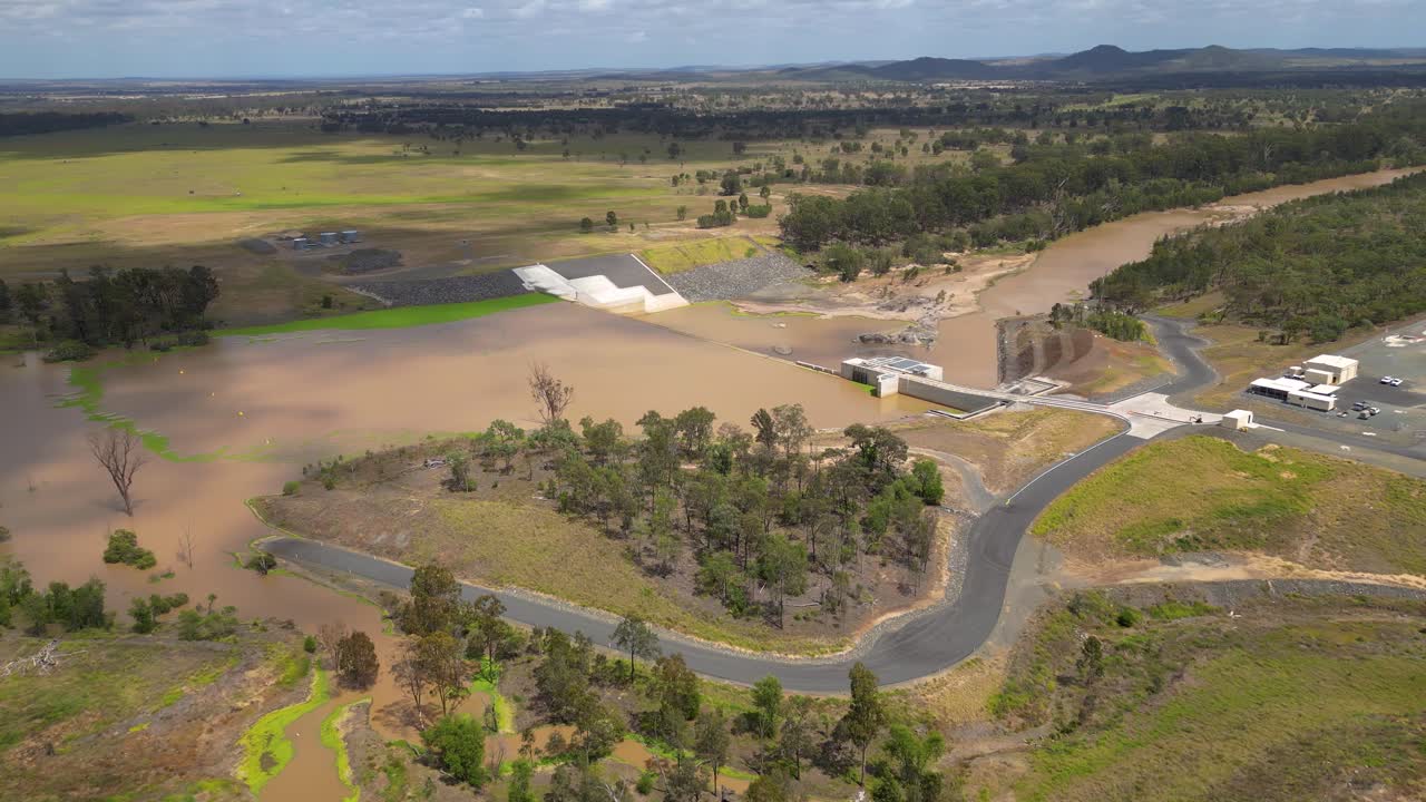 Right to left aerial views over Rookwood Weir and the Fitzroy River, West of Rockhampton, Central Queensland, Australia.
