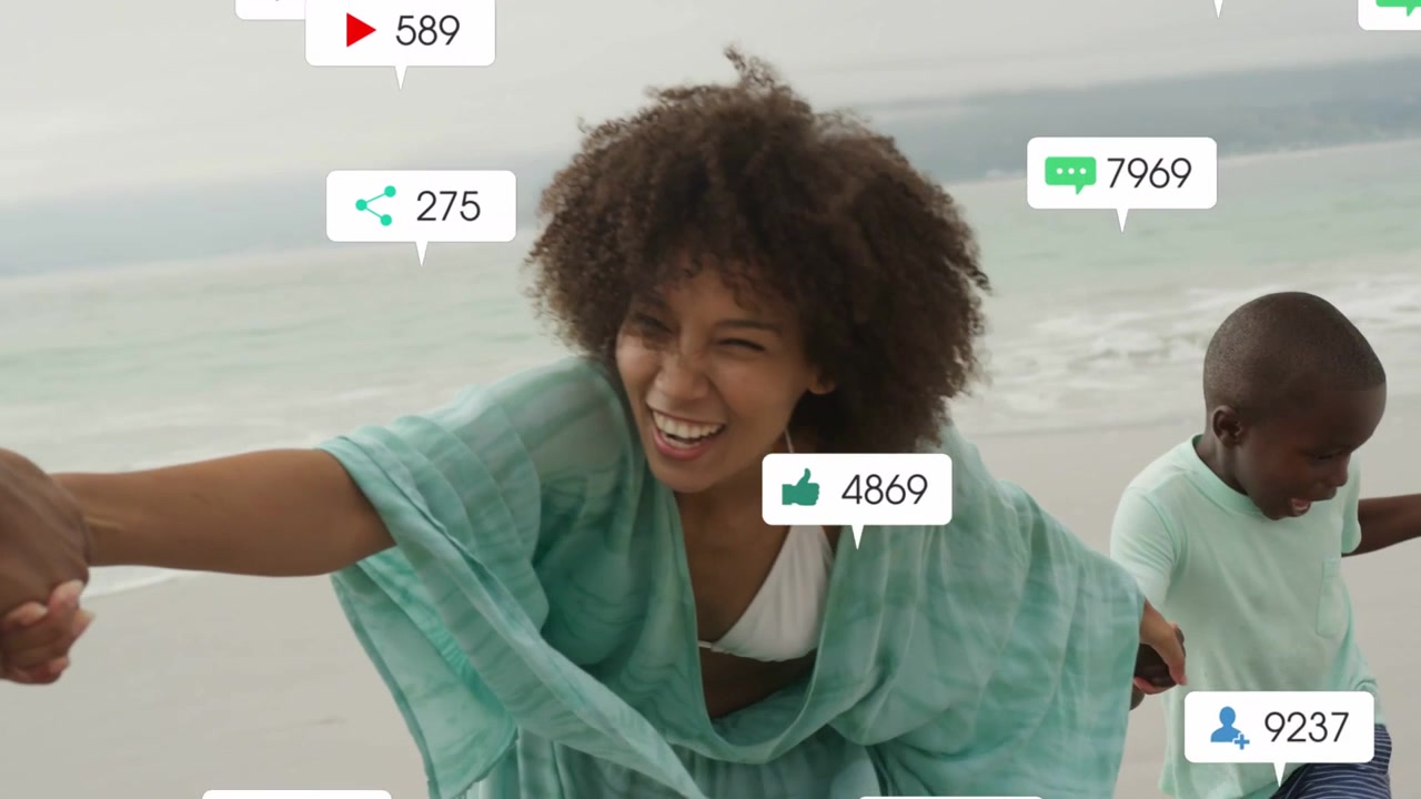 Family holding hands on beach, social icons multiplying around them, signaling marketing engagement