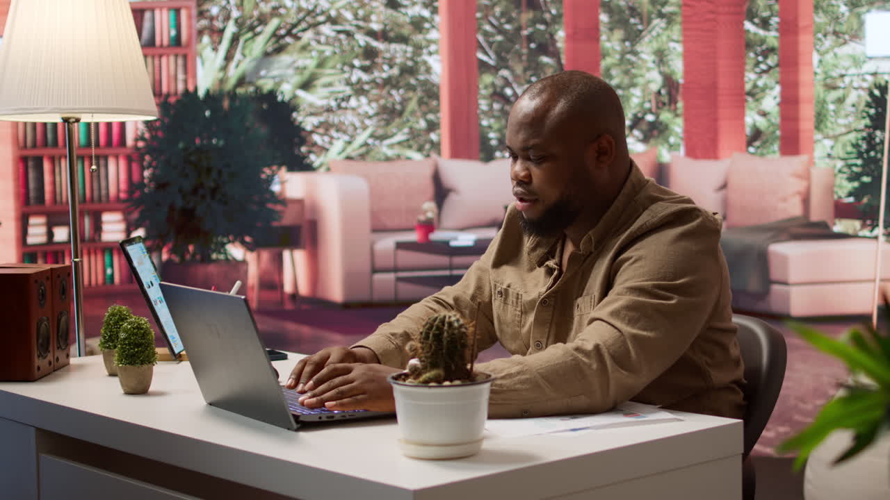 Freelancer using his laptop to manage business analytics and financial planning