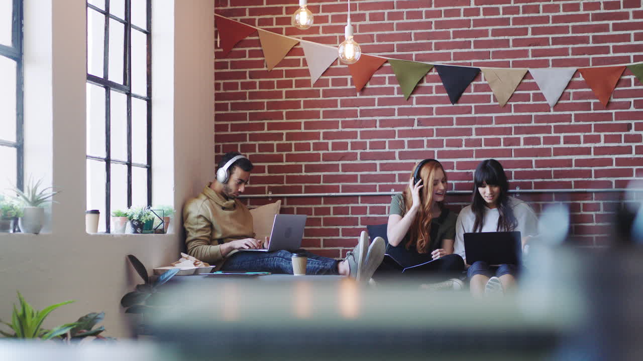 Creative startup, music and employees working