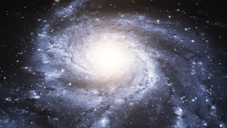 a galaxy with a bright light in the middle, the universe