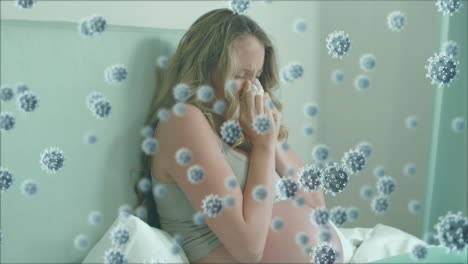 animation of macro covid-19 cells floating over pregnant caucasian woman sneezing