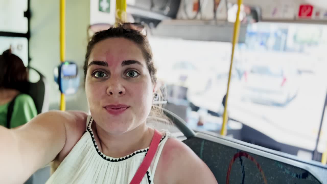 Happy Tourist Vlogging Joyful Bus Ride Through Athens Streets