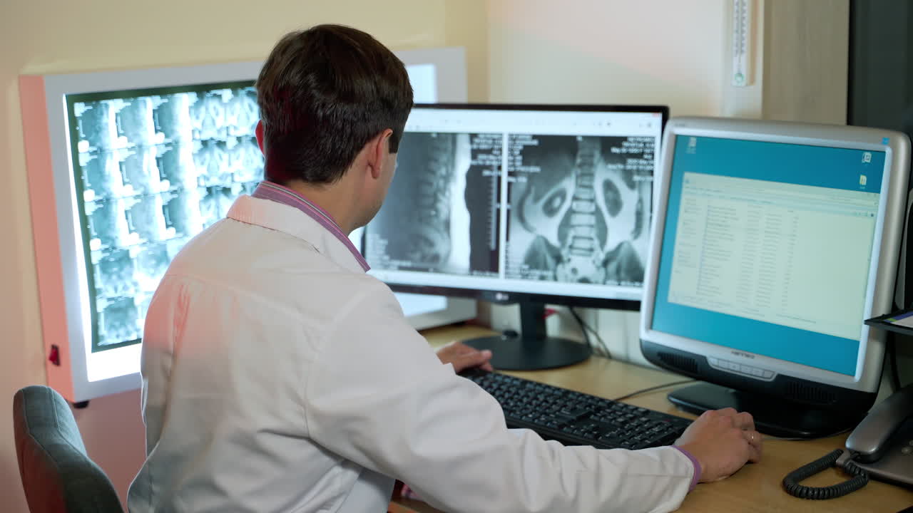 Doctor using computer in the hospital. Medical Scientist working on personal computer in laboratory