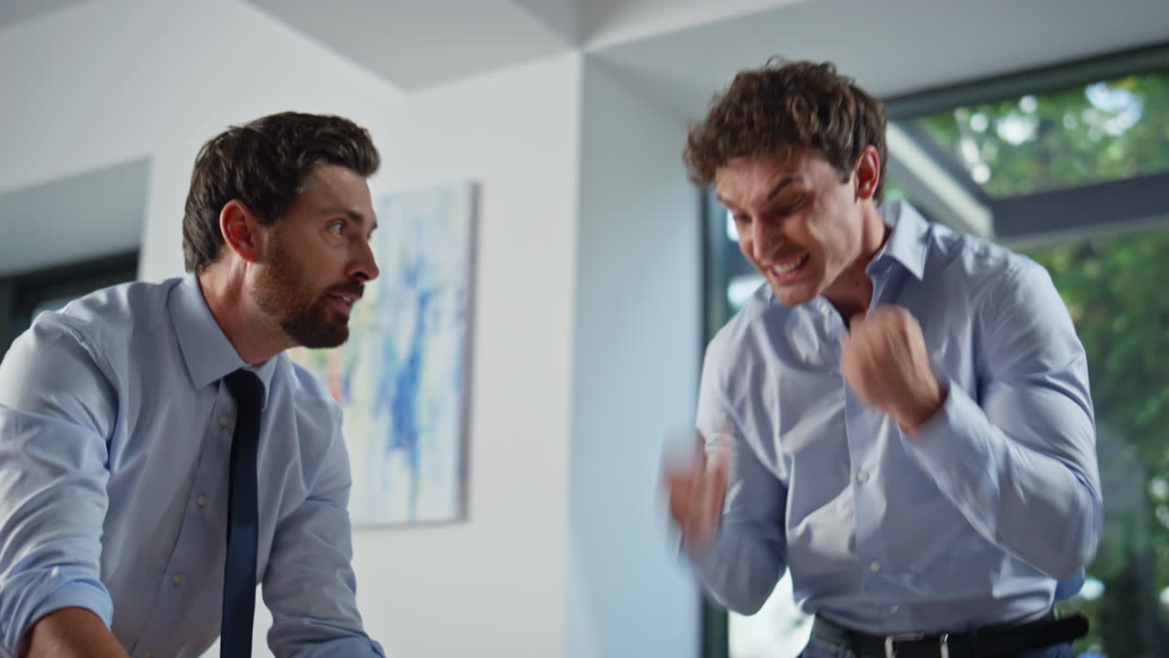 Calling colleagues searching papers at cabinet closeup. Two winners rejoicing