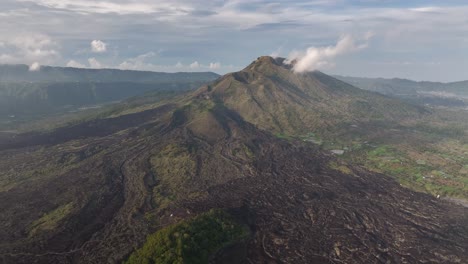 beautiful scenic view of mount batur active volcano in bali with its craters. aerial landscape