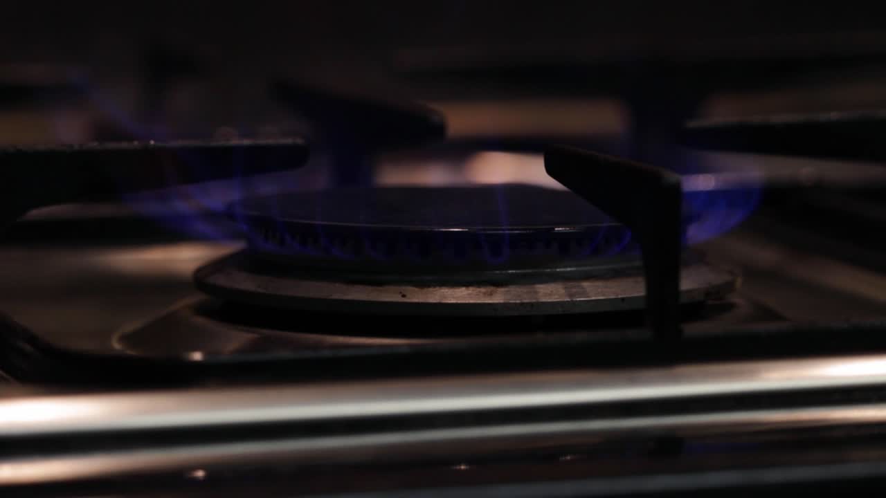 Close up of Gas Hob Ring Igniting to Flame on Cooker