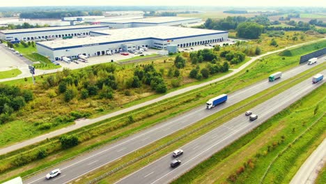 aerial view of logistics center next to the highway