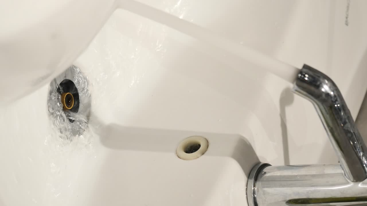 Water flowing into a sink