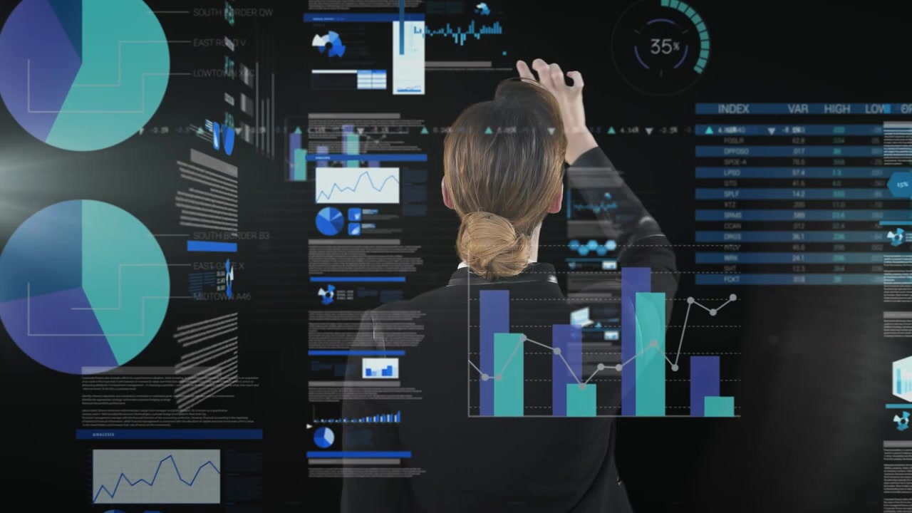 Businesswoman Interacting with Digital Data Visualization Interface