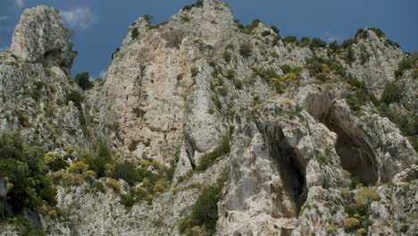 view of the high mountains of capri from the sea