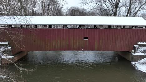 Aerial-view-of-the-side-of-a-wooden-covered-bridge