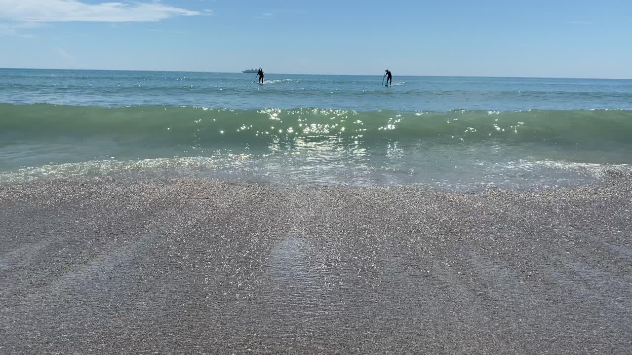 Paddleboarders Cocoa Beach summer fun