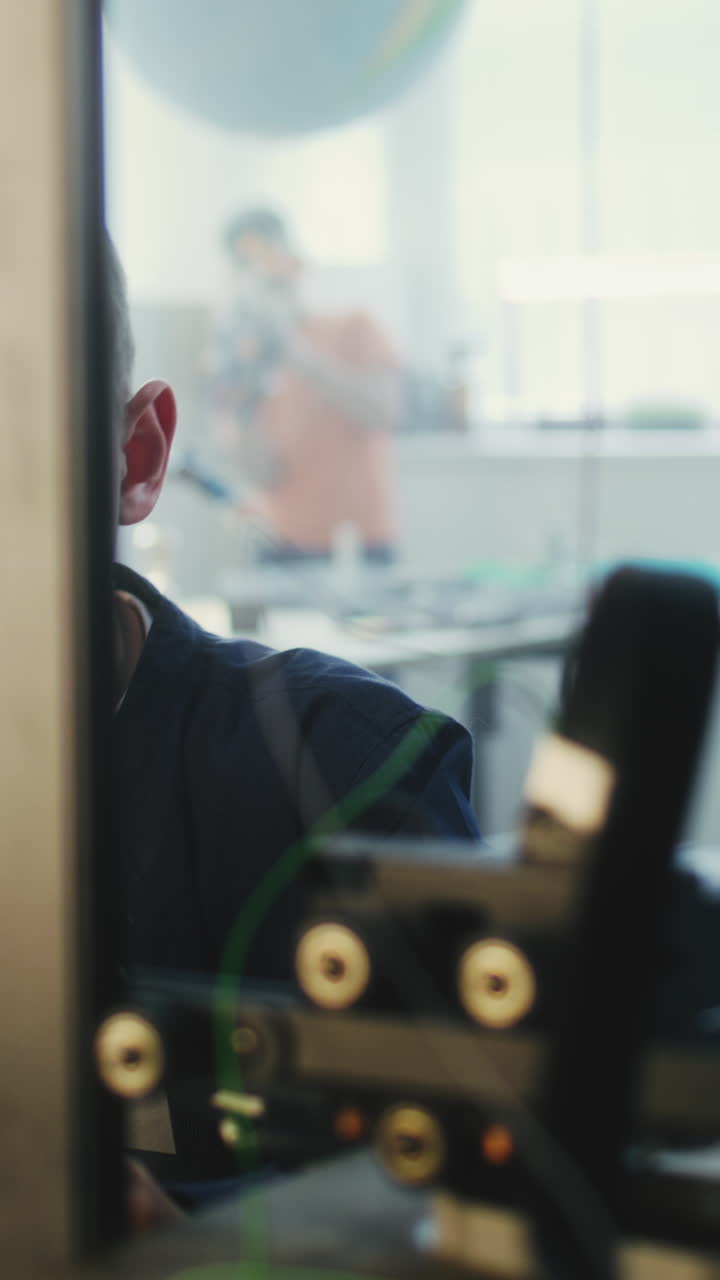 Boy Concentrating on a Project