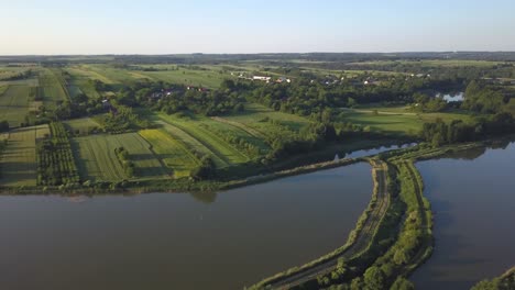 Aerial-pan-to-the-right-of-rice-fields-flooded-in-Poland-on-spring