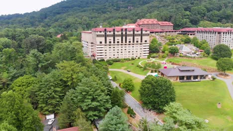 4k drone video of convention center and golf course at grove park inn in asheville, nc on sunny summer day-2