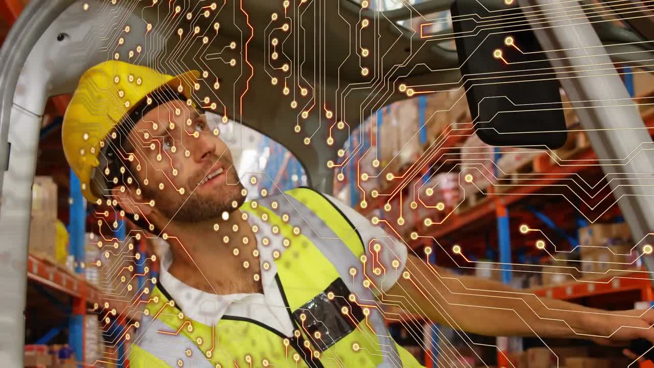 Animation of integrated circuit over happy male caucasian warehouse worker