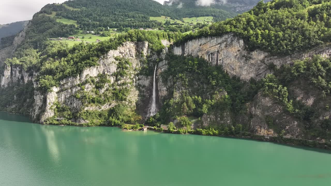 Aerial view of Seerenbach Falls cascading into Walensee near Betlis, Amden, Switzerland